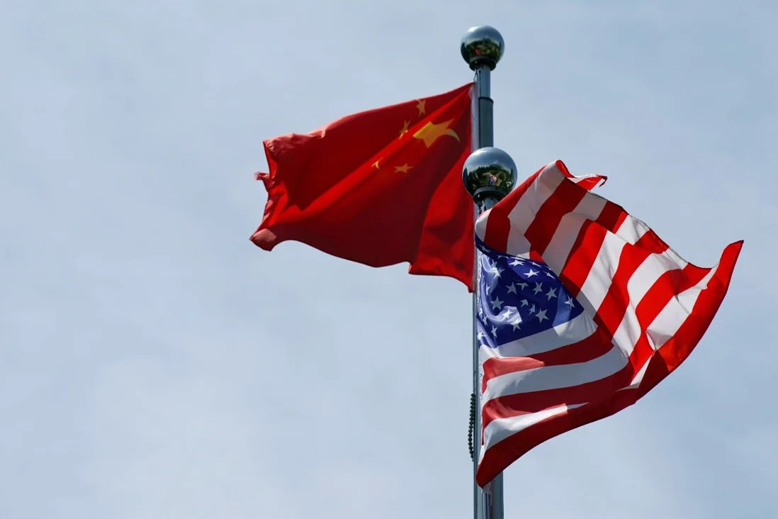 Chinese and US flags flutter near The Bund, before a US trade delegation meet their Chinese counterparts for talks in Shanghai, China, on 30 July 2019.