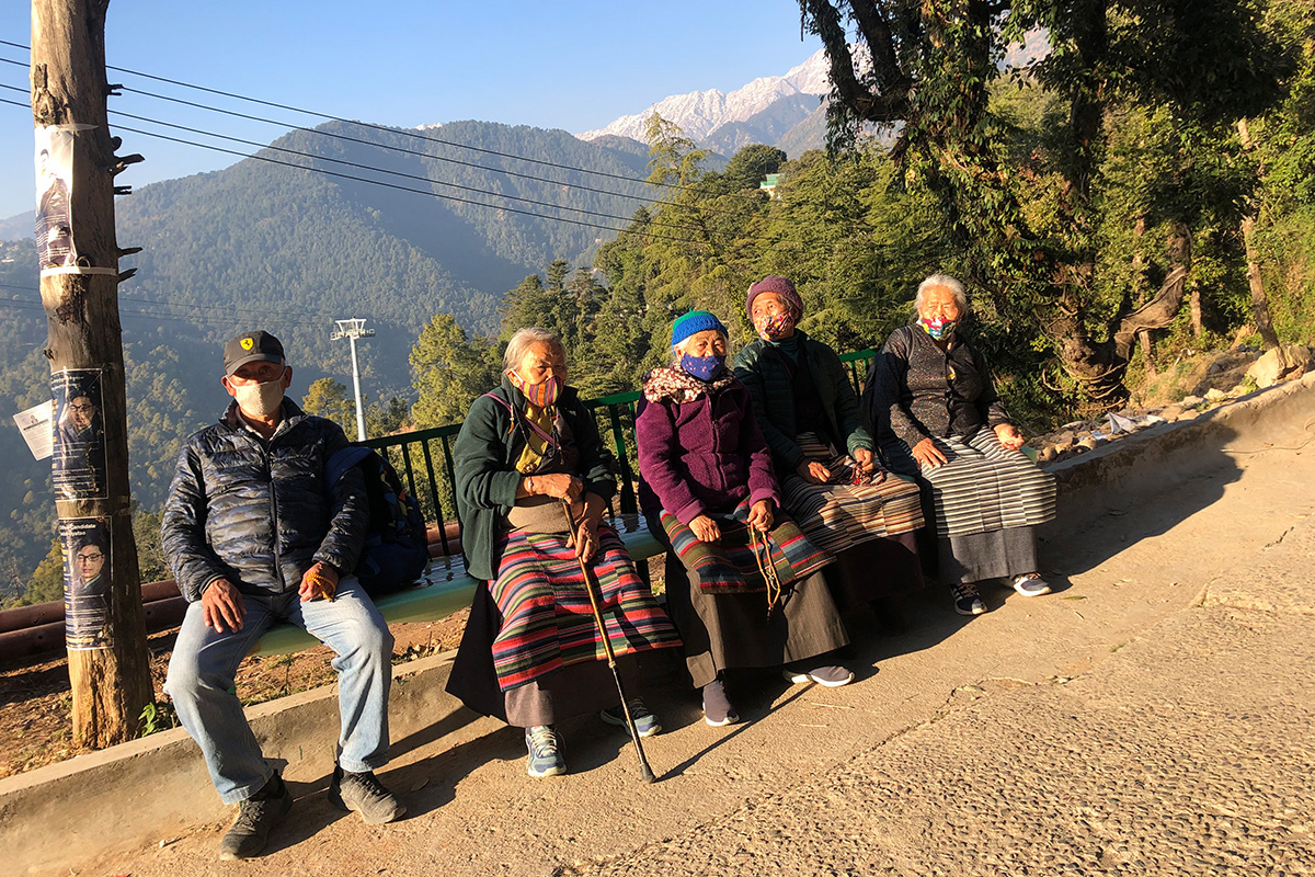 Elderly Tibetans rest while doing lingkor near Jampaling Old People's Home in McLeod Ganj, India, on 26 December 2020.
