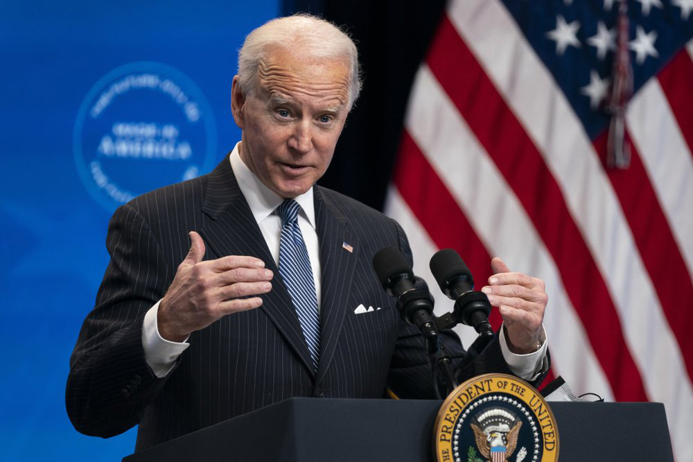 In this 25 January 2021 file photo, President Joe Biden answers questions from reporters in the South Court Auditorium on the White House complex, in Washington. Biden is unlikely to confront China on trade right away because he wants to focus on the coronavirus and the economy, but he does look set to renew pressure over trade and technology grievances that prompted President Donald Trump to hike tariffs on Chinese imports in 2017.