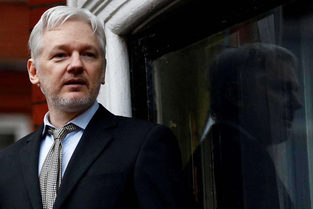 WikiLeaks founder Julian Assange makes a speech from the balcony of the Ecuadorian Embassy, in central London, Britain, on 5 February 2016.