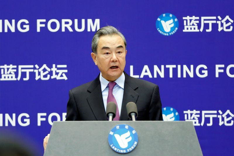 Chinese State Councilor and Foreign Minister Wang Yi delivers a speech at the Lanting Forum in Beijing, China, on 22 February 2021.