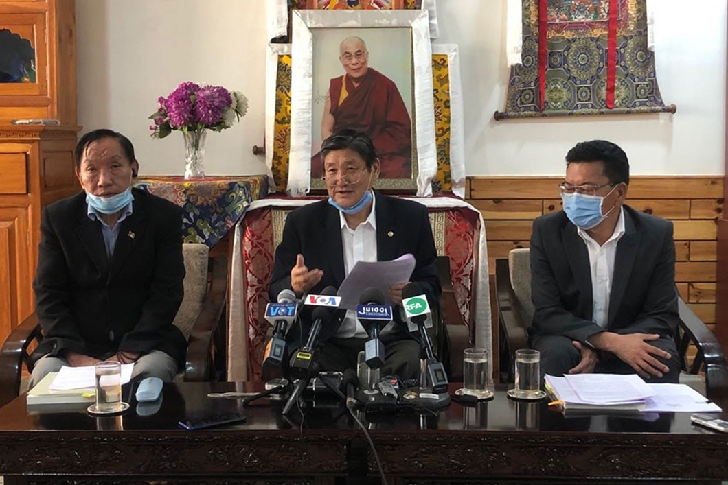 Tibetan Supreme Chief Justice Commissioner Sonam Norbu Dagpo (center), and two Commissioners Karma Damdul (left) and Tenzin Lungtok hold a press conference to announce abdication from their posts following their dismissal by the Tibetan Parliament-in-exile, but said they are not guilty of any wrongdoing, at the Tibetan Supreme Justice Commission in Dharamshala, India, on 26 March 2021. 