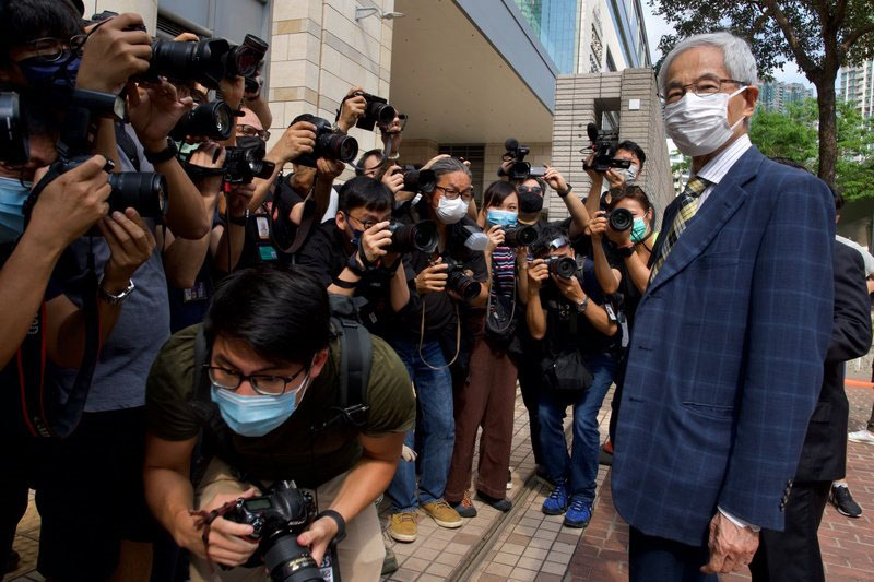 Pro-democracy lawmaker Martin Lee, right, arrives at a court in Hong Kong on 1 April 2021. Seven pro-democracy advocates, including media tycoon Jimmy Lai and veteran of the city's democracy movement Lee, are expected to be handed a verdict for organizing and participating in an illegal assembly during massive anti-government protests in 2019 as Hong Kong continues its crackdown on dissent.