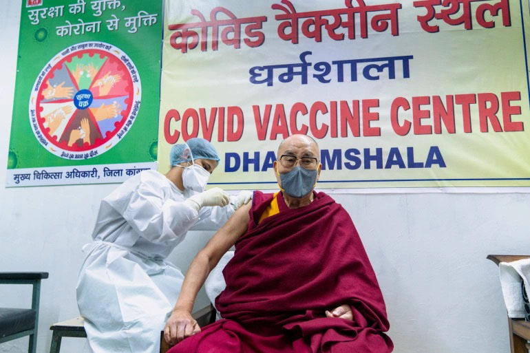 Tibetan spiritual leader, the Dalai Lama, receives a dose of coronavirus disease (COVID-19) vaccine at a vaccination centre in Dharamshala, India, on 6 March 2021.