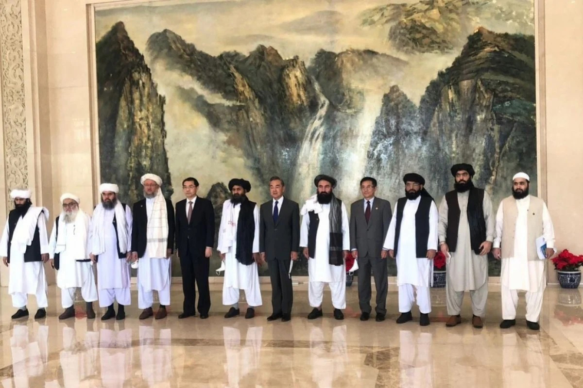 The Taliban delegation with Chinese Foreign Minister Wang Yi in Tianjin, China, on 28 July 2021.