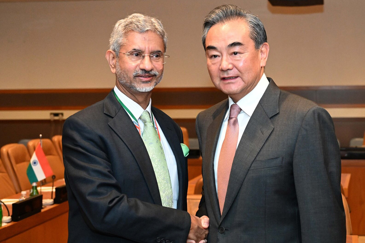 Indian foreign minister S Jaishankar and Chinese foreign minister Wang Yi shake hands during a meeting on 25 September 2019. The two will meet on the sidelines of the Shanghai Cooperation Organisation (SCO) foreign ministers meeting in Dushanbe, Tajikistan, from 13-14 July 2021.