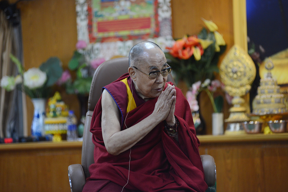 Tibetan spiritual leader the Dalai Lama gestures as he interacts with media members during an event in McLeod Ganj, India, on 25 October 2019.