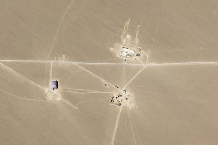 This 25 July 2021, satellite image provided by Planet Labs Inc shows what analysts believe is construction on an intercontinental ballistic missile silo near Hami, China. The US military is warning about what analysts have described as a major expansion of China's nuclear missile silo fields, at a time of heightened tension between the US and China.