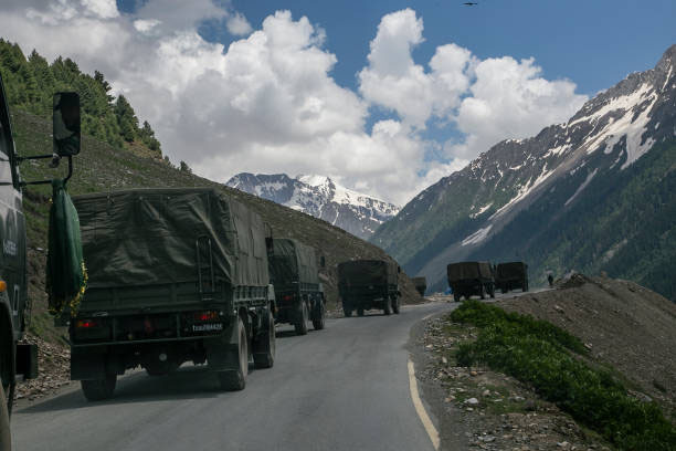 An Indian army convoy, carrying reinforcements and supplies, travels towards Leh through Zoji La, a high mountain pass bordering China in Ladakh, India, on 13 June 2021. The Zoji La mountain pass, considered to be the world's second most dangerous pass at 3529 metres, connects Kashmir Valley and Ladakh.