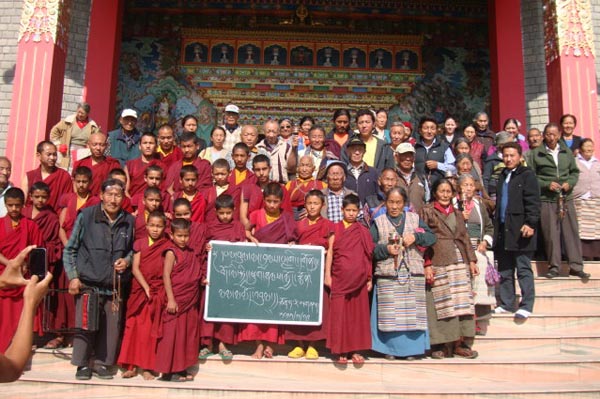 Exile Tibetans in Chauntra pose for a photo