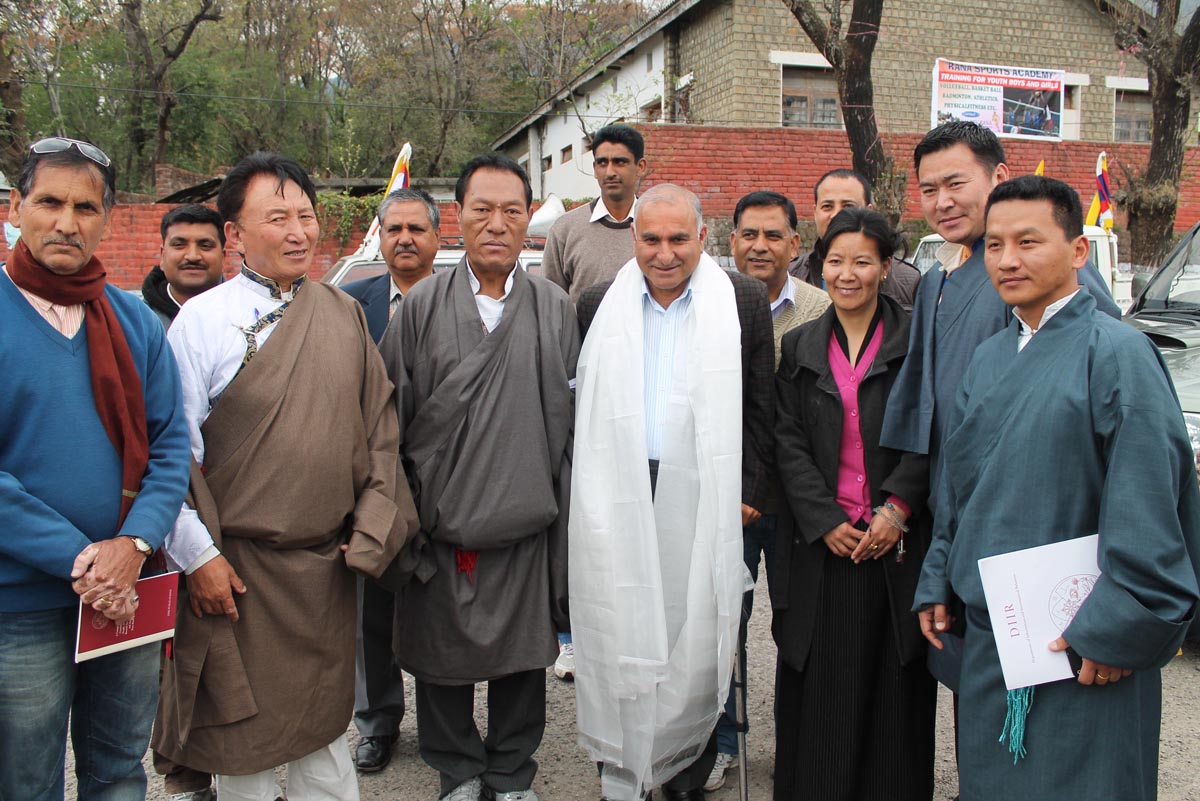 A member of the legislative assembly of Himachal Pradesh, Gulab Singh, poses for a photo with Tibetan Settlement Officers 