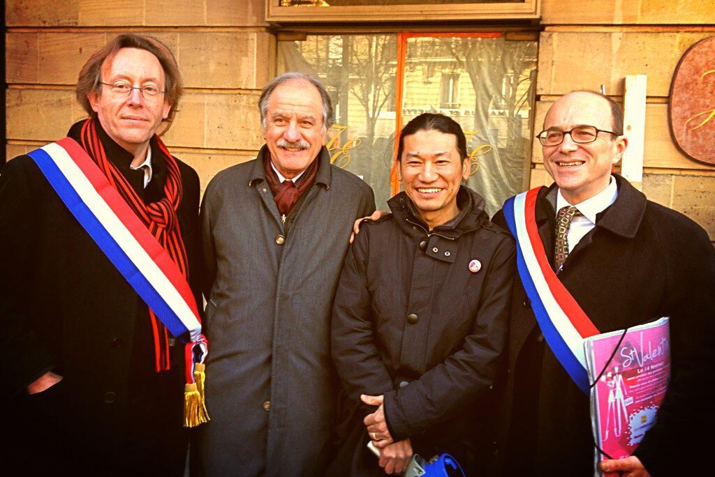 From left: Member of the National Assembly of France Jean-Patrick Gille, Noël Mamère, Tibetan activist Tenam, and French Senator André Gattolin at a Tibet rally in front of the Chinese Embassy in Paris, France. 