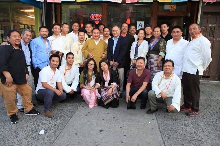 A group of Himalayan youth pose for a photo with Sogyal Rinpoche in Queens, New York.