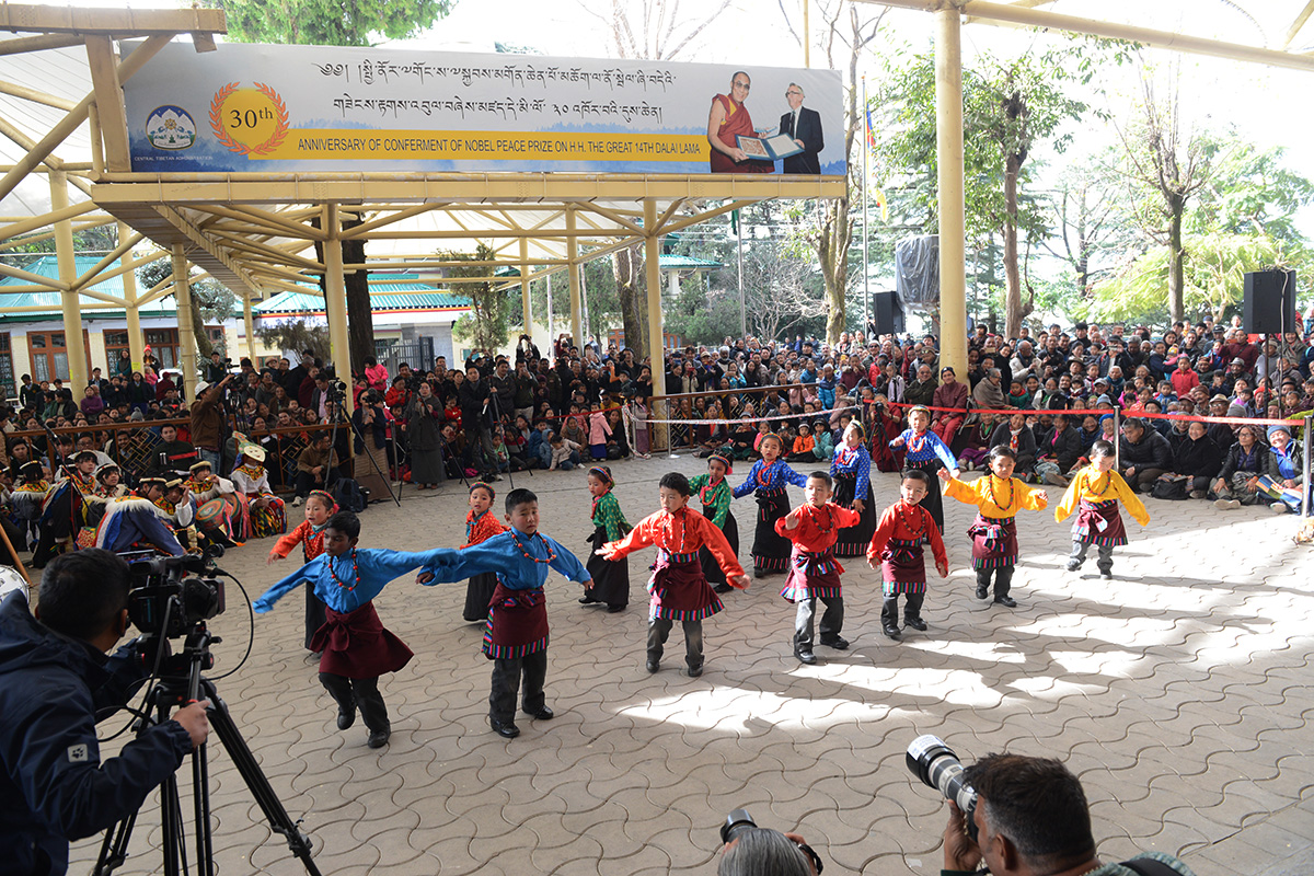 Yongling Kindergarten children performs a traditional Tibetan dance on the occasion of the 30th anniversary of conferment of Nobel Peace Prize on Tibetan spiritual leader the Dalai Lama, at Tsuglakhang Temple in McLeod Ganj, India, on 10 December 2019.