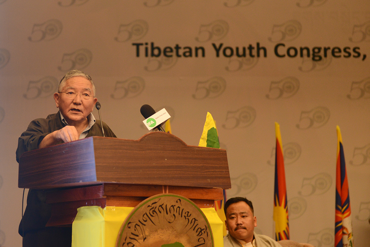 First President of the Tibetan Youth Congress Tenzin Geyche Tethong speaks during the 50-year celebration of organisation in McLeod Ganj, India, on 7 October 2020. TYC President Gonpo Dhondup is seen on the right.