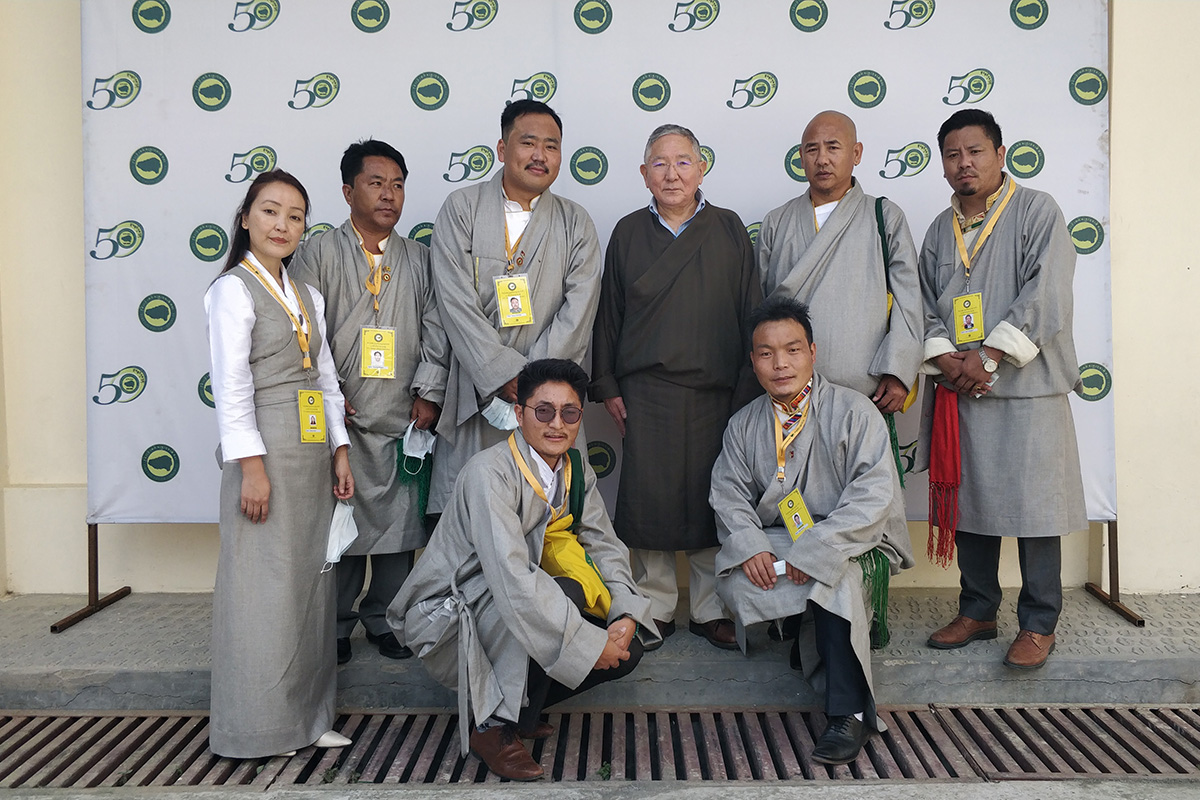 The first President of the Tibetan Youth Congress Tenzin Geyche Tethong (center) with the current executive members of the organisation pose for a photo during the Golden Jubilee celebration in McLeod Ganj, India, on 7 October 2020.