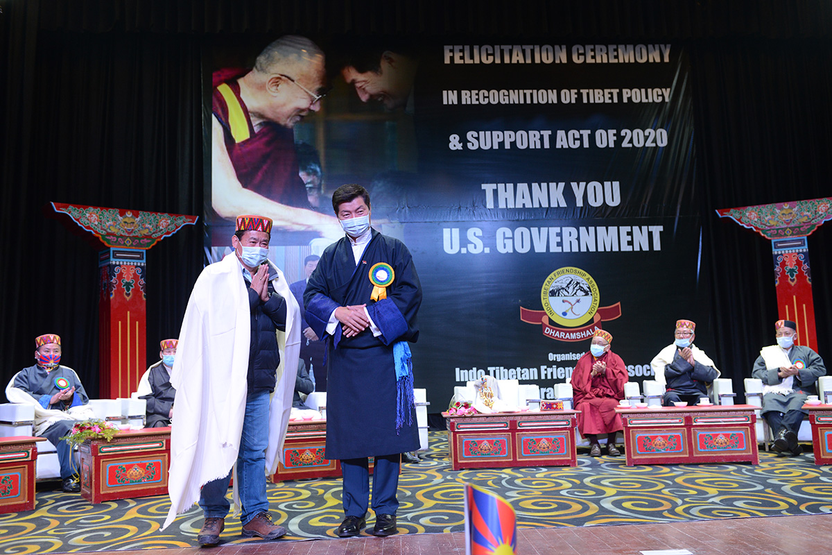 Sikyong Lobsang Sangay honours Choephel Kalsang of Sorig Tibetan Herbal Clinic for his social services during the felicitation for US Government for passing the Tibet Policy and Support Act, 2020, at McLeod Ganj, India, on 16 January 2021.
